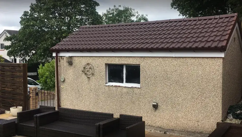 Garage with a new tiled roof