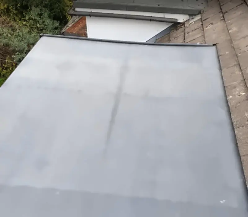 Rubber flat roof over a dormer